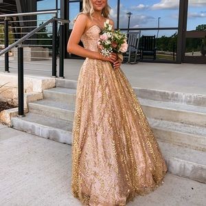 Gorgeous pink prom dress with gold embellishments